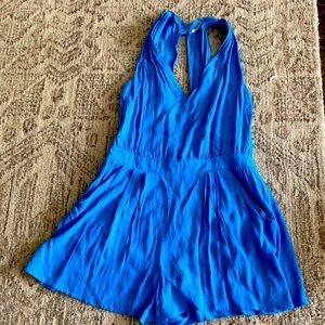 Sky blue romper with open back, button details